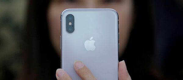 Владелец iPhone X Владелец iPhone X - Sputnik Беларусь