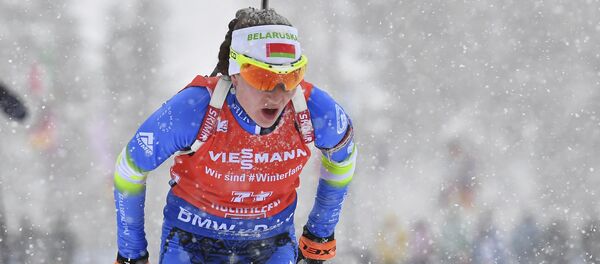 Спортсменка Дарья Домрачева во время спринта в Хохфильцене Спортсменка Дарья Домрачева во время спринта в Хохфильцене - Sputnik Беларусь