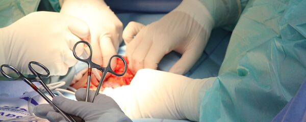 Хирургическая операция, архивное фото - Sputnik Беларусь