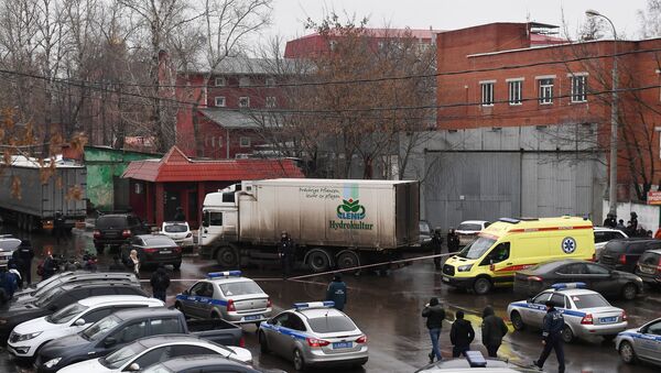 Полиция и автомобиль реанимации на Иловайской улице в Москве - Sputnik Беларусь