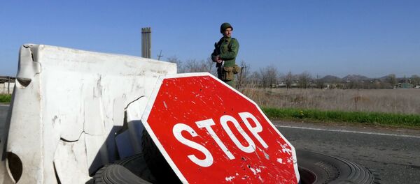 Военнослужащий на блок-посту в Донецкой области, архивное фото - Sputnik Беларусь