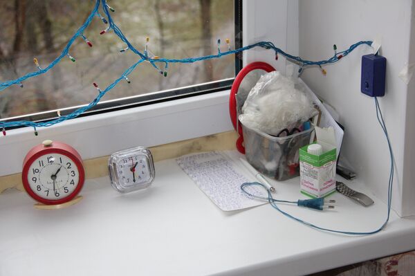 К Новому году пенсионеры украсили дом огоньками - Sputnik Беларусь