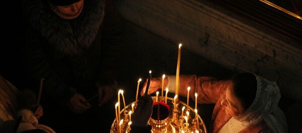 Свечи в церкви, архивное фото - Sputnik Беларусь
