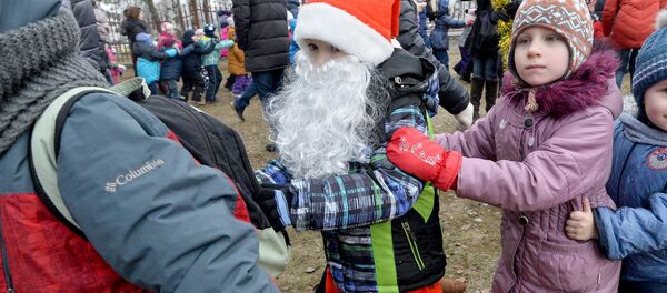 Рождественский праздник собрал гостей у Дома Милосердия - Sputnik Беларусь