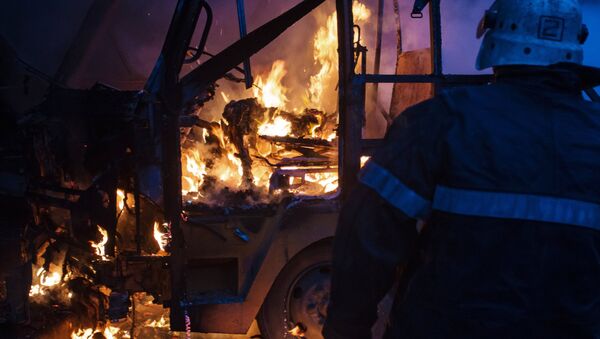 Автобус, поврежденный огнем, архивное фото - Sputnik Беларусь