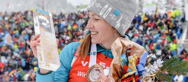 Дарья Домрачева выиграла золото в масс-старте на шестом этапе КМ по биатлону Дарья Домрачева выиграла золото в масс-старте на шестом этапе КМ по биатлону - Sputnik Беларусь