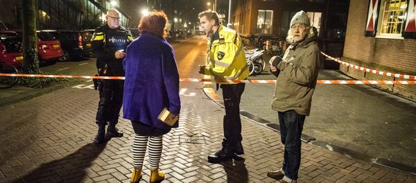 Очевидцы рассказывают полиции о перестрелке в центре Амстердама - Sputnik Беларусь