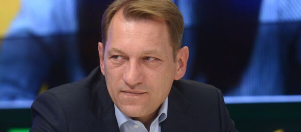 Заместитель главного редактора МИА Россия сегодня Андрей Благодыренко - Sputnik Беларусь