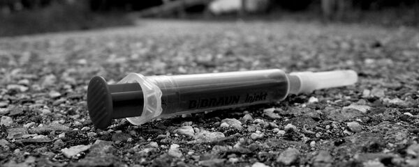 Использованный шприц, архивное фото Использованный шприц, архивное фото - Sputnik Беларусь