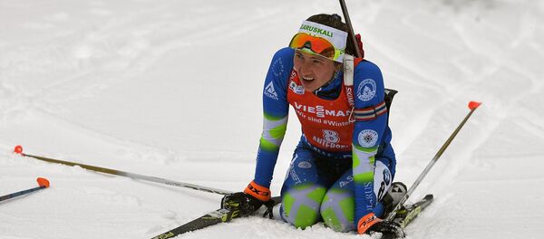 Трохразовая алімпійская чэмпіёнка па біятлоне беларуска Дар'я Домрачава Трохразовая алімпійская чэмпіёнка па біятлоне беларуска Дар'я Домрачава - Sputnik Беларусь