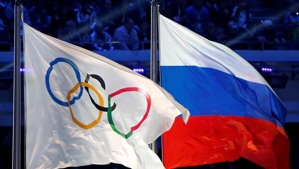 Флаги России и МОК на церемонии закрытия Игр-2014 - Sputnik Беларусь