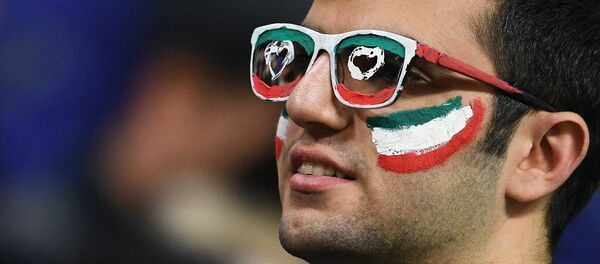 Иранский болельщик во время товарищеского матча по футболу между сборными командами России и Ирана Иранский болельщик во время товарищеского матча по футболу между сборными командами России и Ирана - Sputnik Беларусь