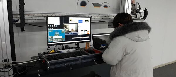 Афиша-пылесос и интерактивные фотобоксы: чудо-техника в Пхенчхане Афиша-пылесос и интерактивные фотобоксы: чудо-техника в Пхенчхане - Sputnik Беларусь