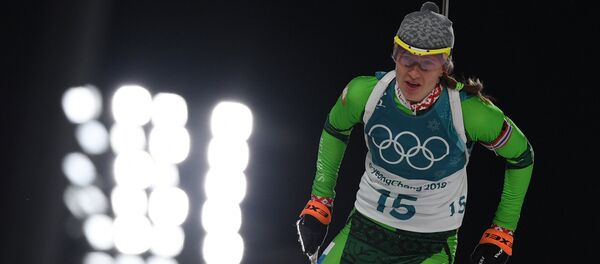 ОДарья Домрачева на дистанции спринтерской гонки в соревнованиях по биатлону ОДарья Домрачева на дистанции спринтерской гонки в соревнованиях по биатлону - Sputnik Беларусь