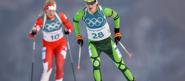 Дарья Домрачева во время индивидуальной гонки в Пхенчхане - Sputnik Беларусь