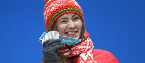 Олимпийская чемпионка Дарья Домрачева Олимпийская чемпионка Дарья Домрачева - Sputnik Беларусь