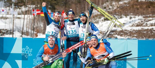 Прызёры біятлоннага спрынту сярод спартсменаў з парушэннямі зроку ў катэгорыі В3 Прызёры біятлоннага спрынту сярод спартсменаў з парушэннямі зроку ў катэгорыі В3 - Sputnik Беларусь