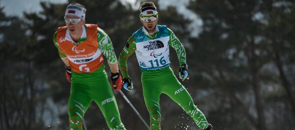 Белорусские лыжники Юрий Голуб и Дмитрий Будилович - Sputnik Беларусь