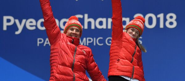 Ведущий Роман Ященко и Светлана Сахоненко (Беларусь) на Паралимпиаде-2018 - Sputnik Беларусь