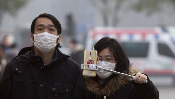 Жители Пекина во время смога, архивное фото - Sputnik Беларусь