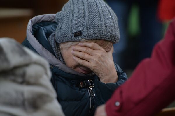 Родственница одного из пропавших без вести при пожаре в торговом центре в Кемерово - Sputnik Беларусь