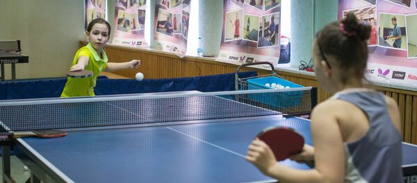 Дети играют в настольный теннис, архивное фото - Sputnik Беларусь