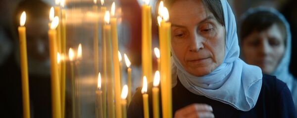 Верующая, архивное фото Верующая, архивное фото - Sputnik Беларусь