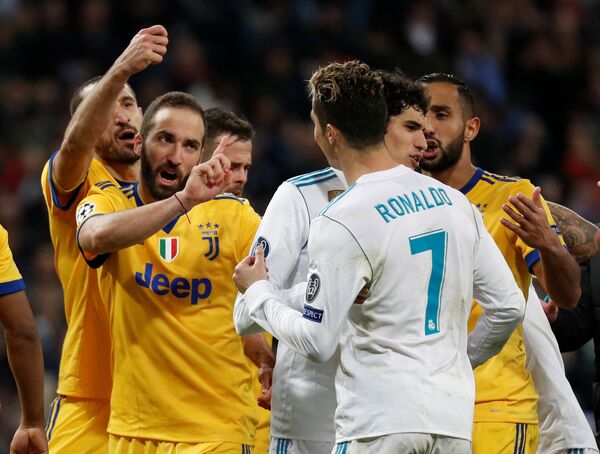 Футболисты Реала и Ювентуса в матче 1/4 финала Лиги чемпионов - Sputnik Беларусь