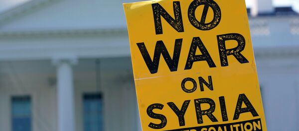 Плакат на демонстрации в Вашингтоне - Sputnik Беларусь