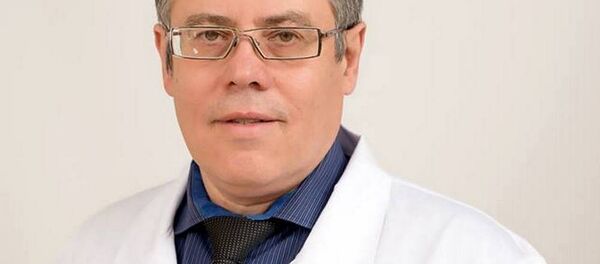 Профессор, доктор медицинских наук, заведующий кафедрой оториноларинологии ГрГМУ Олег Хоров - Sputnik Беларусь