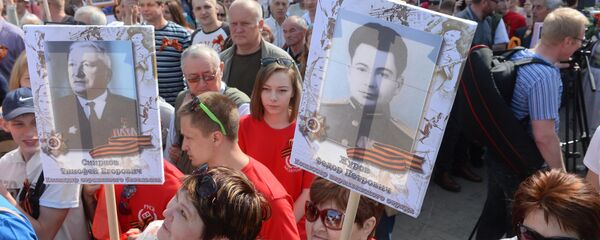 Акцыя Бессмяротны полк у Мінску Акцыя Бессмяротны полк у Мінску - Sputnik Беларусь