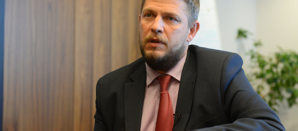 Заместитель председателя правления Белгазпромбанка Александр Сотников Заместитель председателя правления Белгазпромбанка Александр Сотников - Sputnik Беларусь