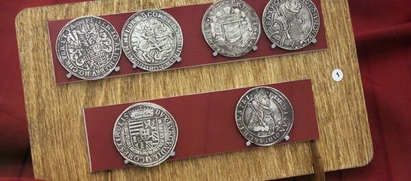 Антыкварныя падробкі рэйхсталераў Аўстрыі Фердынанда ІІ, талераў Трансільваніі Жыгімонта Баторыя і георталераў графства Мансфельд Антыкварныя падробкі рэйхсталераў Аўстрыі Фердынанда ІІ, талераў Трансільваніі Жыгімонта Баторыя і георталераў графства Мансфельд - Sputnik Беларусь