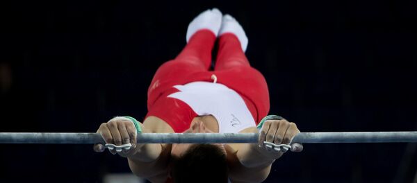Гімнаст на перакладзіне, архіўнае фота - Sputnik Беларусь