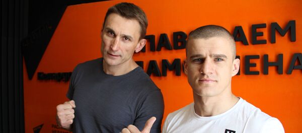 Организатор и основатель профессионального бойцовского турнира Осьминог Сергей Иванович и многократный чемпион мира по кикбоксингу, участник турнира Осьминог Павел Шелест - Sputnik Беларусь