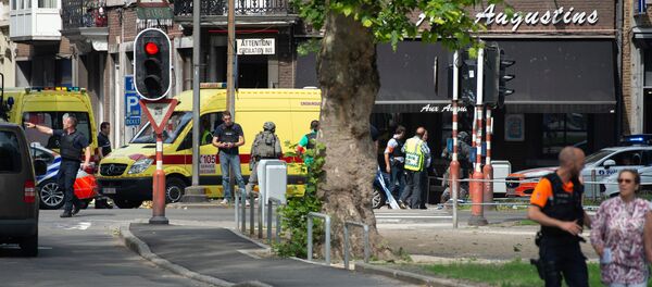 Преступник застрелил двоих женщин-полицейских и прохожего, а затем пытался взять заложника в Льеже - Sputnik Беларусь
