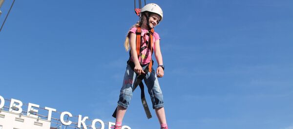 Один из самых популярных аттракционов у детей на празднике МЧС вот уже несколько лет - Sputnik Беларусь