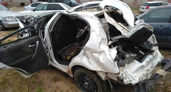 Автомобиль, принадлежавший компании Namba Taxi, марки Ravon Nexia, в котором разбилась Миссис мира 2018  Сания Шакирова  - Sputnik Беларусь