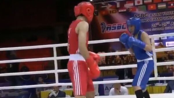 Бой казахстанской боксерши Еркежан Даулетжанкызы с вьетнамкой-мужчиной, видео - Sputnik Беларусь