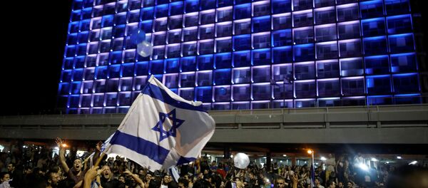 Жители Израиля радуются победе страны в Евровидении Жители Израиля радуются победе страны в Евровидении - Sputnik Беларусь