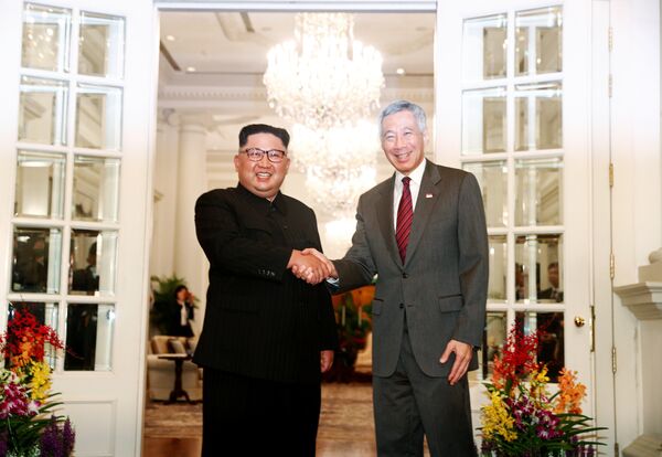 Лидер КНДР Ким Чен Ын и премьер-министр Сингапура Ли Сяньлун - Sputnik Беларусь