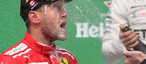 Немецкий пилот команды Феррари Себастьян Феттель - Sputnik Беларусь