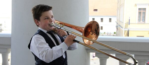 Юны беларускі трамбаніст Ілля Кісялёў з Салігорску Юны беларускі трамбаніст Ілля Кісялёў з Салігорску - Sputnik Беларусь