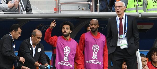 Мохаммед Салах (Египет) и главный тренер сборной Египта Эктор Купер (справа) Мохаммед Салах (Египет) и главный тренер сборной Египта Эктор Купер (справа) - Sputnik Беларусь