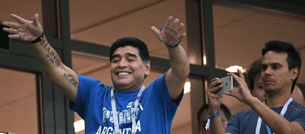 Диего Марадона на зрительской трибуне, архивное фото Диего Марадона на зрительской трибуне, архивное фото - Sputnik Беларусь