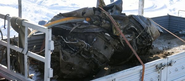 Вывоз фрагментов самолета Ан-148 с места крушения в Подмосковье - Sputnik Беларусь