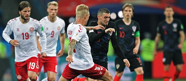 Лассе Шёне (Дания), Симон Кьер (Дания), Матео Ковачич (Хорватия) в матче 1/8 финала чемпионата мира по футболу между сборными Хорватии и Дании - Sputnik Беларусь