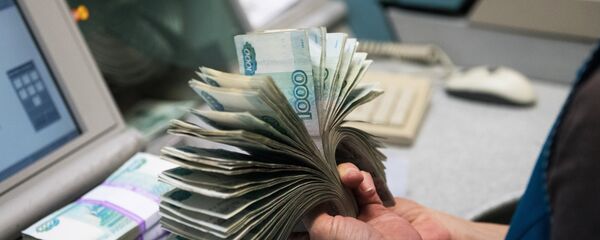 Российские рубли, архивное фото Российские рубли, архивное фото - Sputnik Беларусь