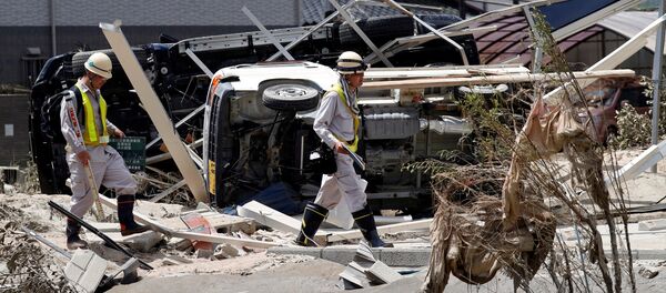 Последствия смертельного наводнения в Японии Последствия смертельного наводнения в Японии - Sputnik Беларусь