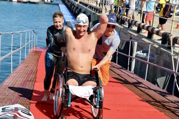 Дистанцию Алексей проходил с поводырем-партнером Юлией Толкачевой - Sputnik Беларусь